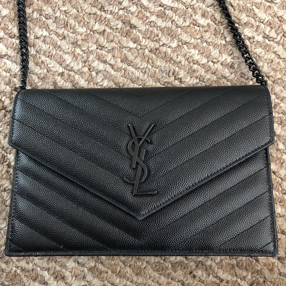 SOLD 100% AUTHENTIC YSL wallet on a chain.